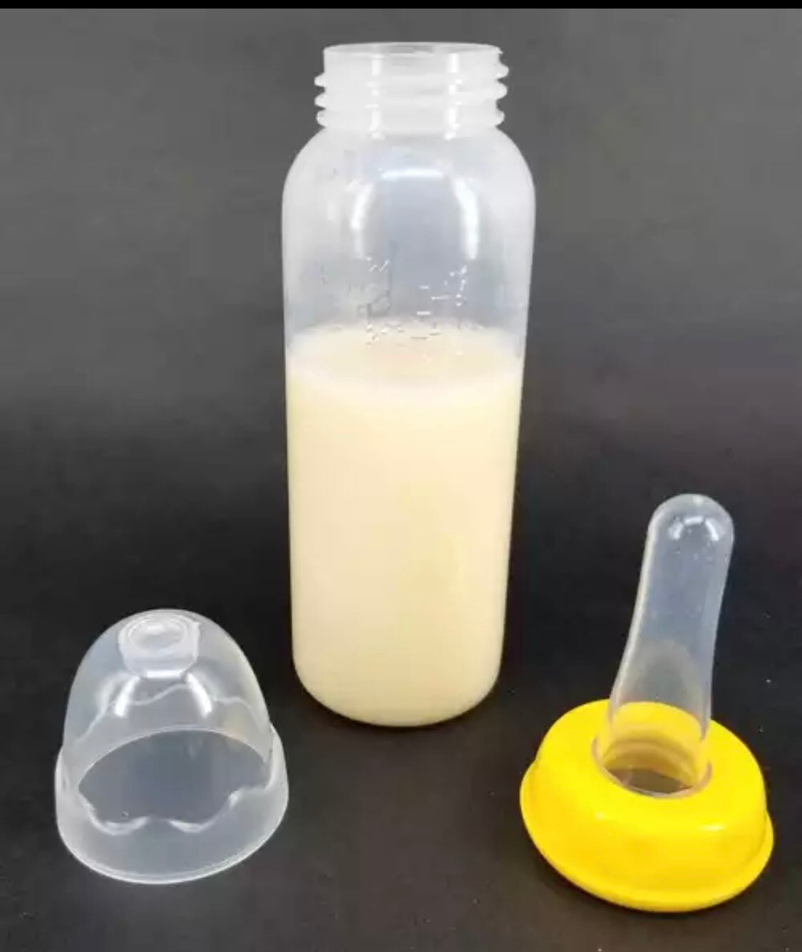 DDLGVERSE adult sized baby bottle with nipple with yellow cap